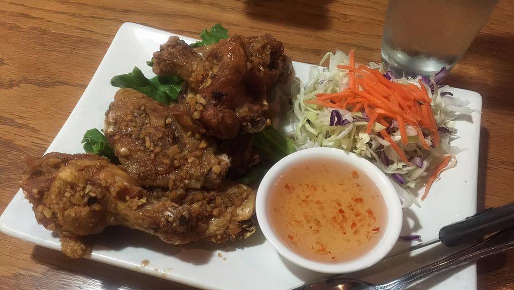 Fried Chicken Wings · Served with sweet garlic sauce.