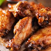 Bone-In BBQ Wings · Served with carrot & celery
