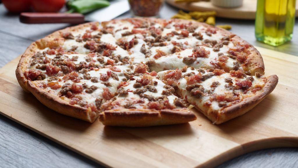 Cheeseburger Pizza · This pizza has our signature red sauce, fresh diced mozzarella, crunchy bacon & ground beef.