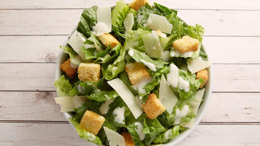 Caesar Salad · Romaine lettuce crouton romano cheese and caesar dressing. served with garlic bread or italian bread.