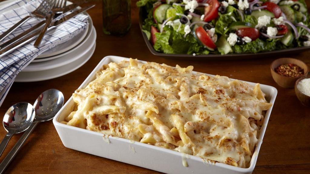 Baked Ziti · Ziti smothered in our homemade tomato sauce. baked with our shredded mozzarella and fresh ricotta cheese.