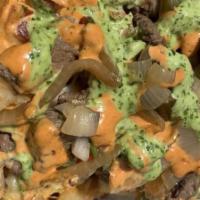 Loaded Fries · Seasoned fries topped with mozzarella cheese, tri tip steak, grilled onions, jalapenos, pico...