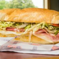 #11 Stickball Special · Provolone, ham and salami. Served Mike's Way with onions, lettuce, tomato, vinegar, oil, ore...