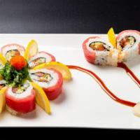 R8. Cherry Blossom Roll · Inside: spicy tuna, cucumber. top: tuna, tobiko, seaweed salad, lemon.