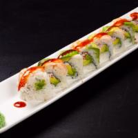 R18. Tiger Roll · Shrimp tempura, cucumber. Top: salmon, ebi, avocado, tobiko, scallion (spicy mayo).