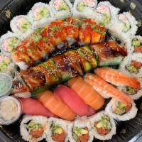 T5. Grand Sushi Tray (38) · Spicy tuna roll, dragon roll, lion king roll, nigiri (six), california roll