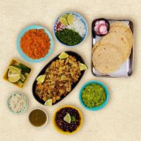 Chicken Taco Kit · 1 pound of protein, 12 hand-made corn tortillas, mexican rice, chopped onions, cilantro, shr...
