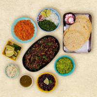 Carne Asada Taco Kit · 1 pound of protein, 12 corn tortillas, mexican rice, chopped onions, cilantro, shredded chee...