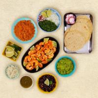 Grilled Shrimp Taco Kit · 1 pound of protein, 12 hand-made corn tortillas, mexican rice, chopped onions, cilantro, shr...