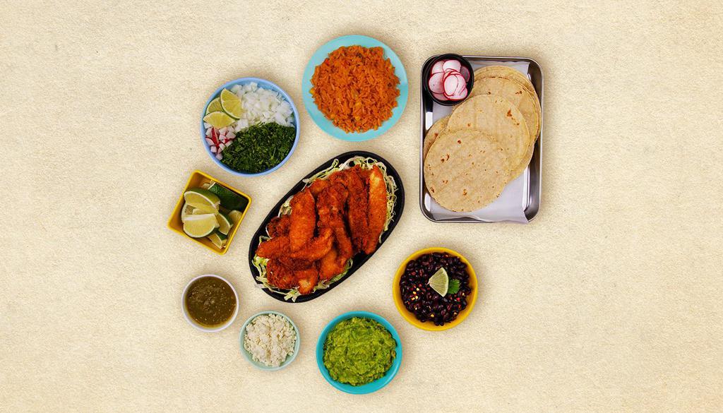 Baja Fish Taco Kit · 1 pound of protein, 12 hand-made corn tortillas, mexican rice, chopped onions, guacamole, cilantro, shredded cheese, salsa verde, limes.