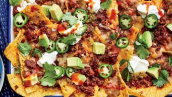 Chorizo Nachos · Classic chorizo nachos with melted cheese, pico de gallo, beans, and your choice of toppings.