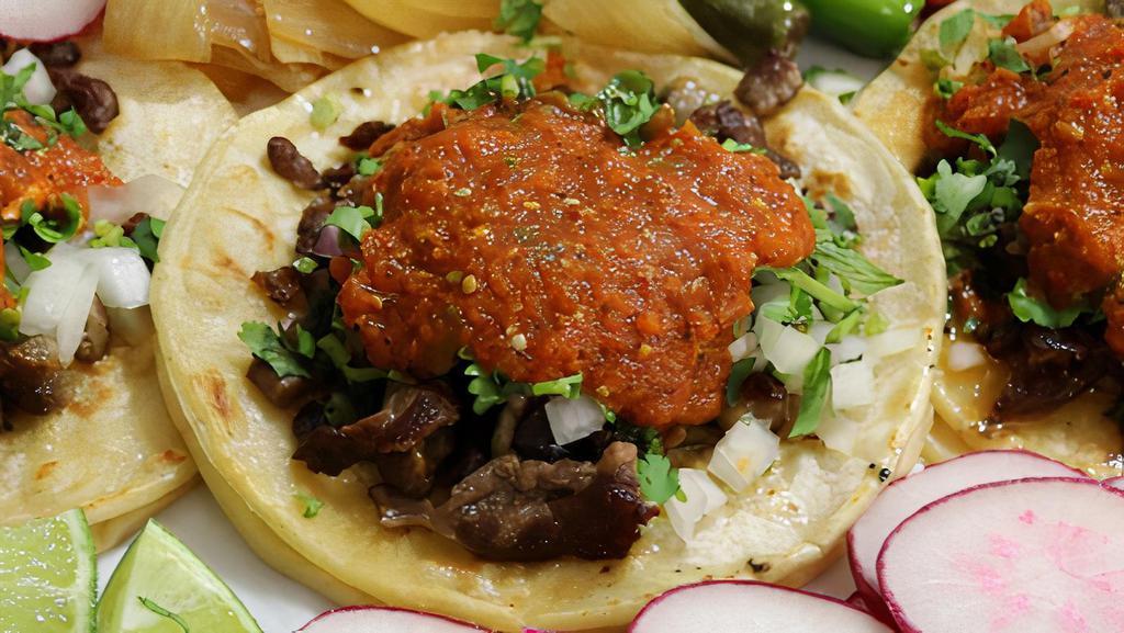 Taco Regular · Tasty corn tortilla filled with favorite meat choice, onion, cilantro, and salsa.