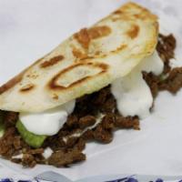 Quesadilla con Carne · 7” Flour tortilla filled with your favorite meat choice and creamy melted cheese.