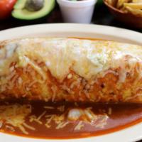 Super Burrito Mojado · A 14” Flour tortilla covered with our homemade and delicious tomato sauce, stuffed with rice...