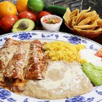 ENCHILADAS ROJAS · three rolled corn torilla filled with your choice of meat, topped with our tasty homemade mo...
