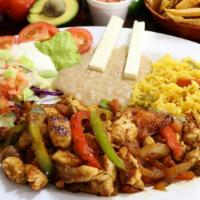 Fajitas de Pollo · tender chicken breast strips slightly spiced and cooked with red and green bell pepper, onio...
