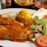 Chile Relleno  · One fresh poblano green peppers stuffed with fresh cheese, topped with homemade tomato sauce...