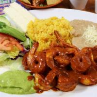 Camarones a La Diabla · Fresh shrimp sautéed with homemade hot sauce, served with salad, rice, refried beans, cheese...