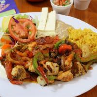 Fajitas De Camaron · Fresh savory shrimp slightly spiced and cooked with red and green bell pepper, onion and tom...