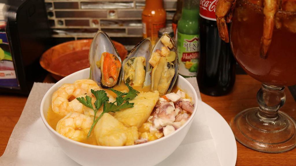 Caldo Marisquero · shrimp, fish, octopus, crab, and clams brought to a boil, making a delicious seafood soup. Add additional items for additional charges.
