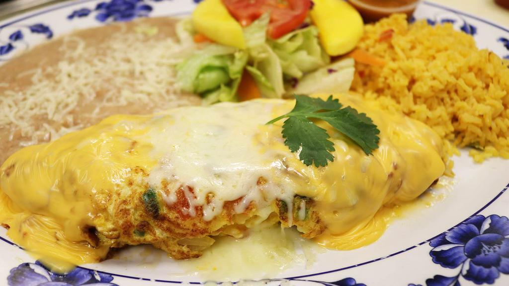 Omelet a La Mexicana · 3 eggs, mixed with chopped tomato, onion, jalapeño, topped with American cheese and Monterey cheese, served with refried beans, rice, and salad.