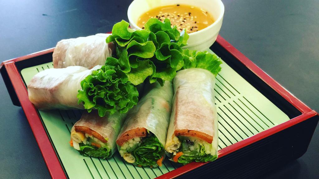 A4. BBQ Pork Roll · Nem nướng cuốn. Vegan. Special grill ham, crispy roll, picked vegetables, mint n basil roll in rice paper served with green lotus signature sauce.
