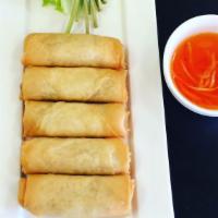 A7. Egg Roll · Chả gi. Vegan. Deep fried egg rolls, lettuce and herbs served with fish sauce.