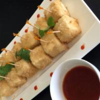 A12. Crispy Tofu · Dậu hủ chiên giòn. Vegan. Deep fried young tofu served with our signature sweet and sour sau...