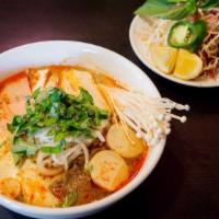 N2. Spicy Noodle Soup · Bún hu. Vegan. Spicy. Spicy rice noodle soup with beef, ham, tofu and mushroom.