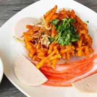 18. Banh Uot Tom Chấy · Classic rice crepe filled with ground shrimp, shrimp & sweet potato fritter, herb/veggie ble...