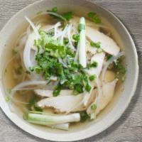 P16- Pho Ga Trang · Rice noodles in a house-cooked chicken bone broth with white meat, and side of fresh herbs.