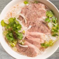 P4- Pho Chin · Beef rice noodle soup with Well-Done Lean Brisket and a side of fresh herbs (includes bean s...