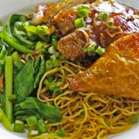 34. Mi Ga Chien · Egg Noodles ( with soup or without soup ) with Fried Chicken.