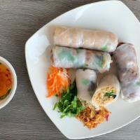 3. Bi Cuon - Shredded Pork Spring Rolls · Shredded pork wrapped in rice paper with fresh herbs and vermicelli, served with our famous ...