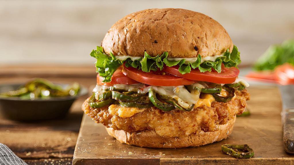Colorado Crispy Chicken  · Crispy chicken breast, pepperjack cheese, melted cheddar cheese, grilled chiles, lettuce, tomato, mayo, on a toasted spicy chipotle bun.