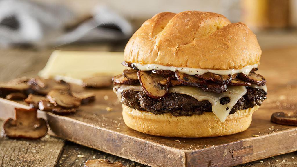 Truffle Mushroom Swiss Black Bean Burger · Black bean patty, aged Swiss cheese, sautéed crimini mushrooms, truffle mayo, toasted bun