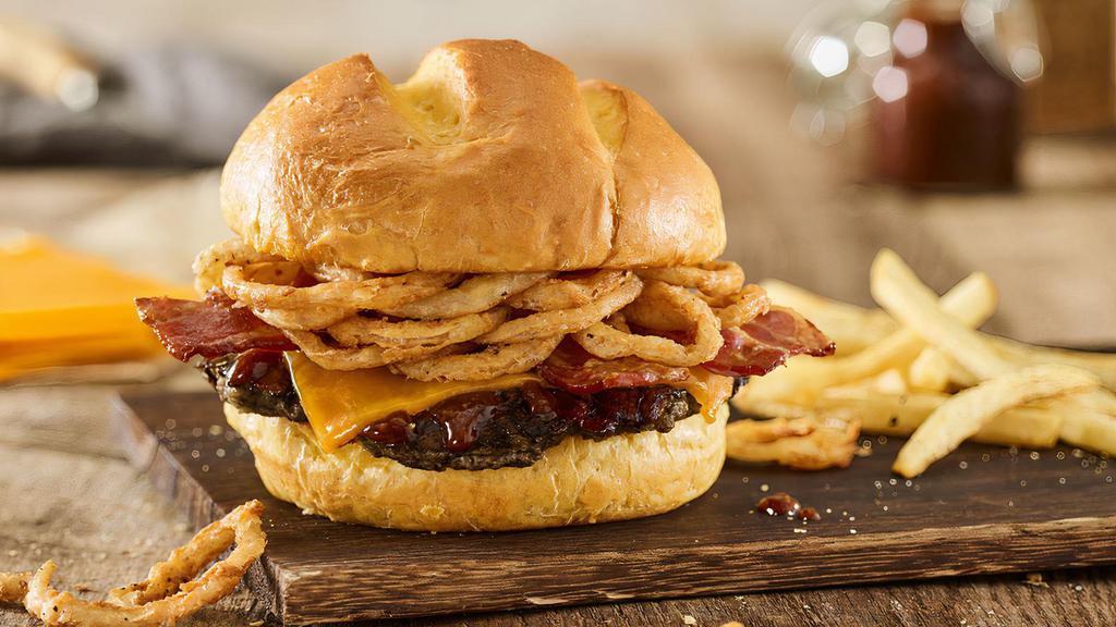 Bbq Bacon Cheddar Black Bean Burger · Grilled black bean patty, BBQ sauce, applewood smoked bacon, cheddar and haystack onions on a toasted classic bun.