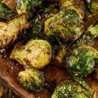 Crispy Brussels Sprouts · Crispy brussles tossed with garlic, spices, served with ranch