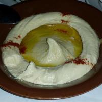 Hummus · Chickpea purée, tahini, garlic and lemon juice.