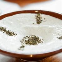 Labneh · Lebanese drained yogurt mixed with garlic and mint.
