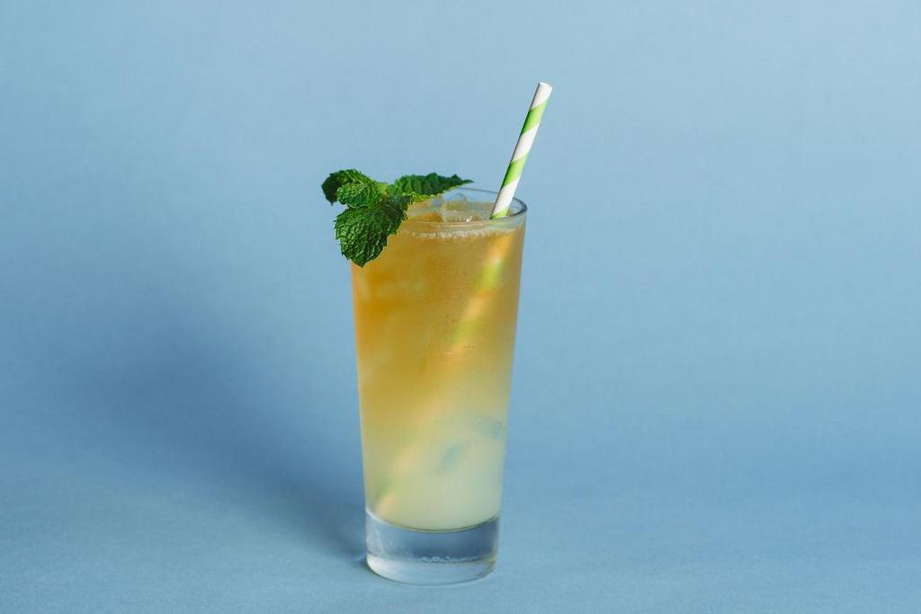 Seasonal Arnold Palmer · Half and half of our homemade lemonade and iced tea with some fresh mint