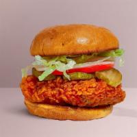 Make Yourself Spicy Chicken Sandwich · Crispy fried chicken, sliced tomatoes, shredded lettuce, jalapenos, and hot sauce. Served on...