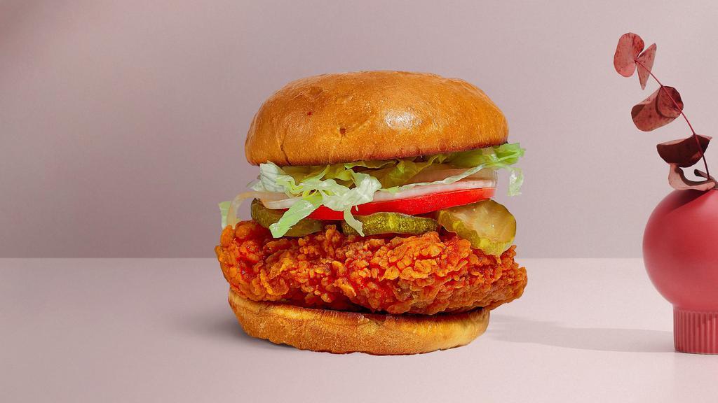 Make Yourself Spicy Chicken Sandwich · Crispy fried chicken, sliced tomatoes, shredded lettuce, jalapenos, and hot sauce. Served on a warm bun.