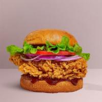 BBQ Believer Chicken Sandwich · Crispy fried chicken, swiss cheese, lettuce, onions, tomatoes, and barbecue sauce. Served on...