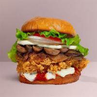 Chick N' Shrooms Sandwich · Crispy fried chicken, sautéed onions, mushrooms, mozzarella cheese, lettuce, and tomatoes. S...