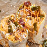 Little Mule Burrito · 3 fried eggs, smoked bacon, tater tots, white american cheese, avocado, pickled jalapeños, c...