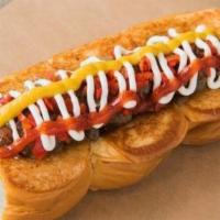Downtown · Smoked bacon dog, caramelized onions, pickled peppers, mayo, mustard, ketchup.