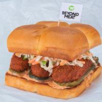 Beyond® The Hot Chick · nashville style fried or grilled beyond® tenders, haus slaw, pickles, secret sauce
