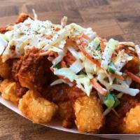 The Love Boat Tots · Tater tots, haus chili, haus slaw.