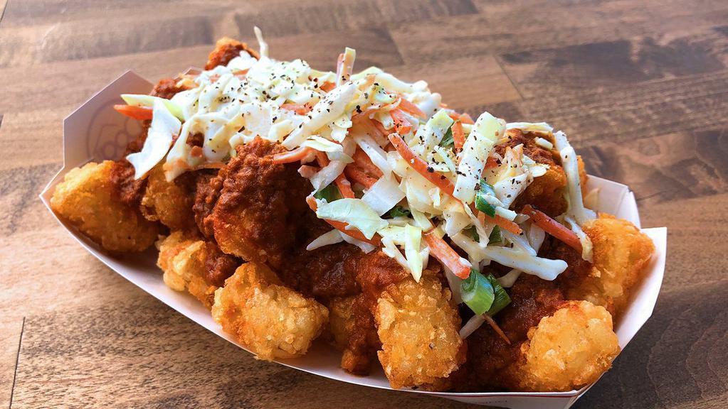 The Love Boat Tots · Tater tots, haus chili, haus slaw.